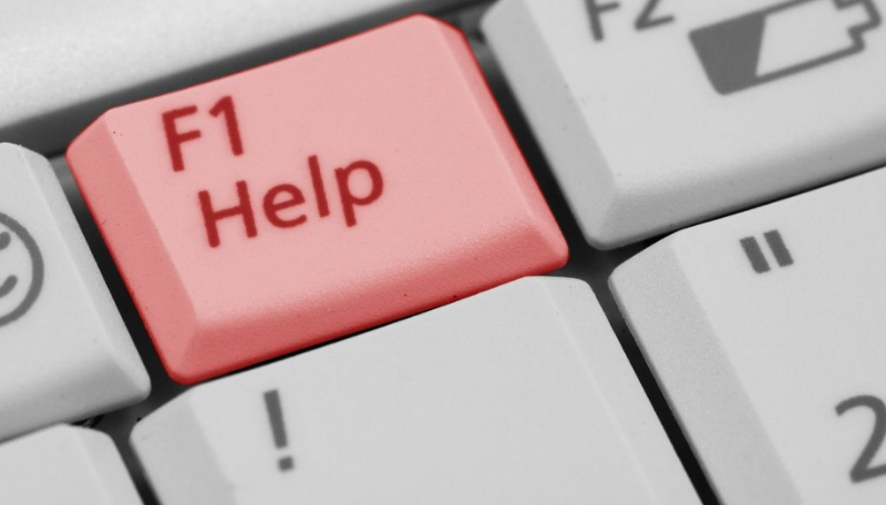 Tastatur mit einer roten Taste auf der Help steht.